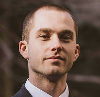 Portrait of Thomas Whitfield, a crypto market expert and trading analyst